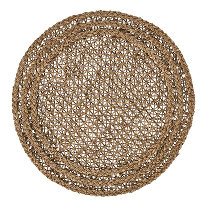 The Le Panier Placemat by Juliska is a round handwoven placemat crafted from natural fibers, featuring a lattice pattern with two braided borders, shown from above against a white background.