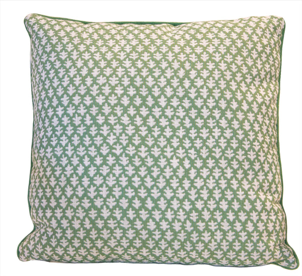 Burma Meadow Outdoor Pillow with a green and white leaf-patterned cover, perfect for adding a touch of nature to your patio. This custom outdoor pillow by Associated Design measures 22"x22".