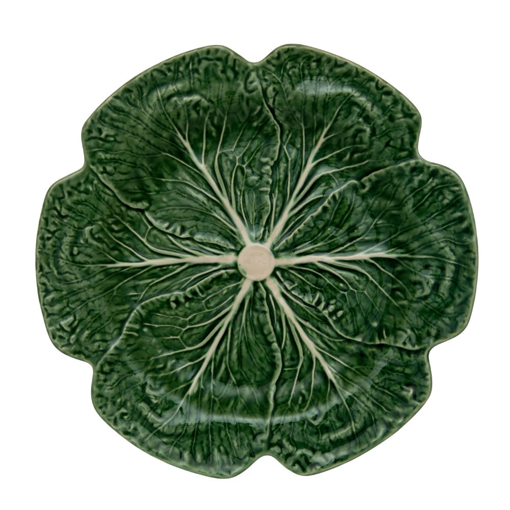 A green ceramic plate from the Green Cabbage Dinnerware Collection by Bordallo Pinheiro, crafted in Portugal with detailed veins and stem to resemble a cabbage leaf.