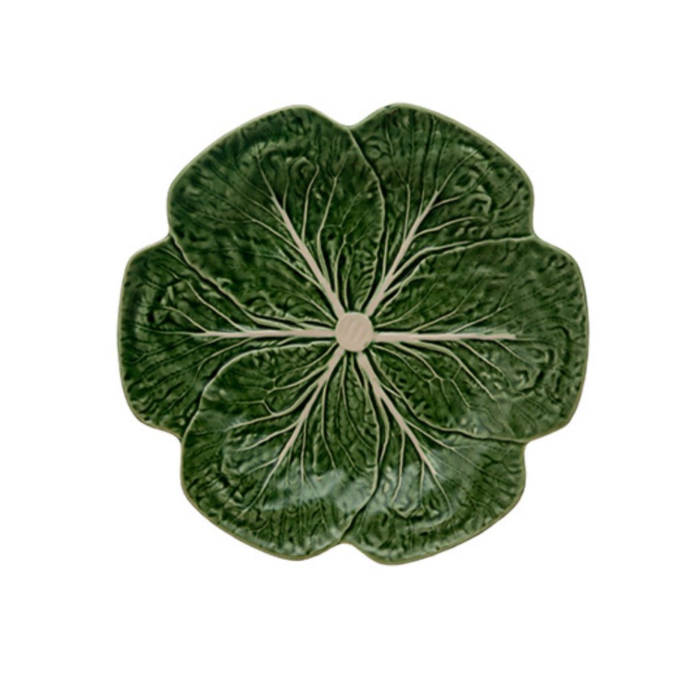 A plate from the Green Cabbage Dinnerware Collection by Bordallo Pinheiro, featuring a leafy cabbage design in green ceramic, is shown from above on a white background.