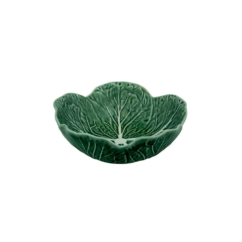 A bowl from the Green Cabbage Dinnerware Collection by Bordallo Pinheiro, crafted in Portugal and designed to resemble a cabbage leaf, is shown on a white background.