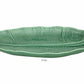 A large green ceramic platter from the HIVE Banana Leaves Platter Collection, shaped like a banana leaf with ribbed detailing, is displayed on a white background.