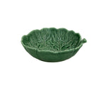 The Hive Geranium Leaf Serveware Collection features a green ceramic bowl shaped like a leaf, complete with vein patterns and a small handle—perfect for adding nature-inspired charm to your tableware.