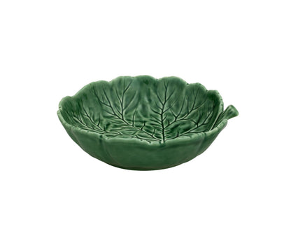 The Hive Geranium Leaf Serveware Collection features a green ceramic bowl shaped like a leaf, complete with vein patterns and a small handle—perfect for adding nature-inspired charm to your tableware.