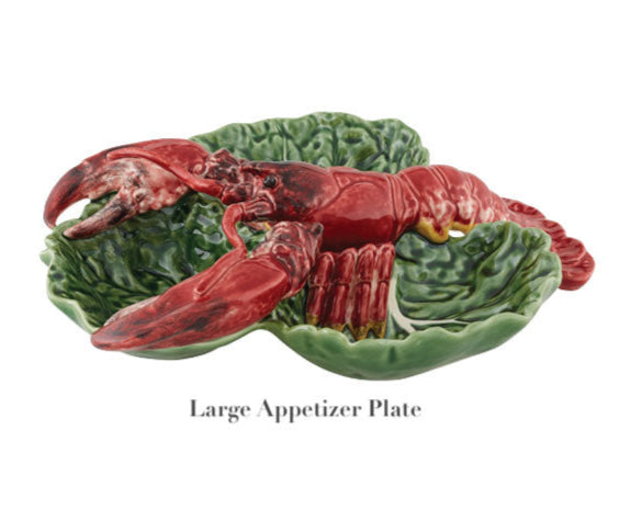 The HIVE Cabbage with Lobsters Serveware Collection features a large handmade ceramic appetizer plate shaped like green cabbage leaves with a red lobster design—ideal for unique serveware displays.