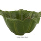 Large green ceramic salad bowl, shaped like overlapping lettuce leaves, from the Bananas From Madeira Serveware Collection by Bordallo Pinheiro. Shown on a white background, with “Large Salad Bowl” text beneath.