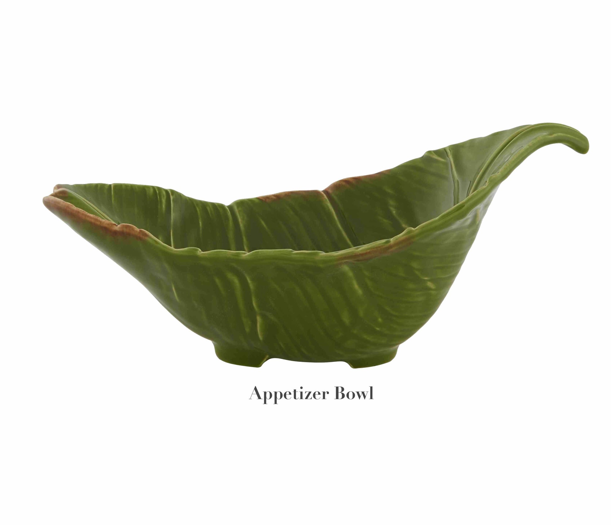 A green ceramic appetizer bowl shaped like a banana leaf with a curved edge, from the Bananas From Madeira Serveware Collection by Bordallo Pinheiro. "Appetizer Bowl" appears below the image.