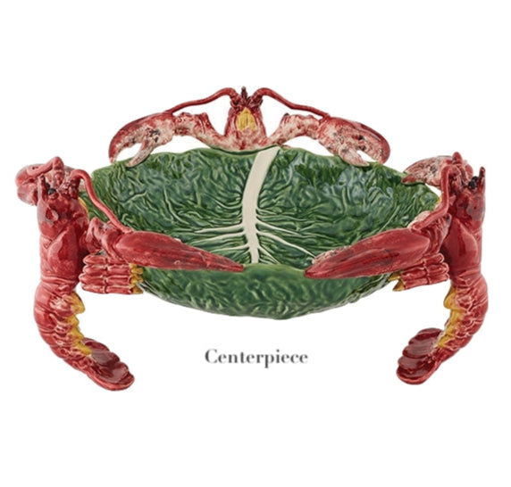 The HIVE Cabbage with Lobsters Serveware Collection centerpiece bowl has a handmade ceramic green leaf design and three red lobster-shaped handles.