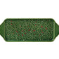 The Hive Holly Serveware Collection features a green rectangular serving tray with raised holly leaves, red berry accents, and handles—ideal as festive holiday table décor or a handmade earthenware plate for gatherings.
