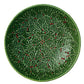 Part of Hive's Holly Serveware Collection, this handmade round plate features green earthenware with raised holly leaves and red berries for a festive holiday touch.