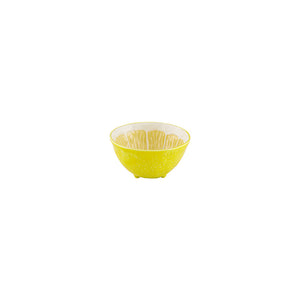 The Lemon Collection by Bordallo Pinheiro features a small, round yellow ceramic bowl with a textured pattern and white interior, evoking whimsical tableware and shown centered on a white background.