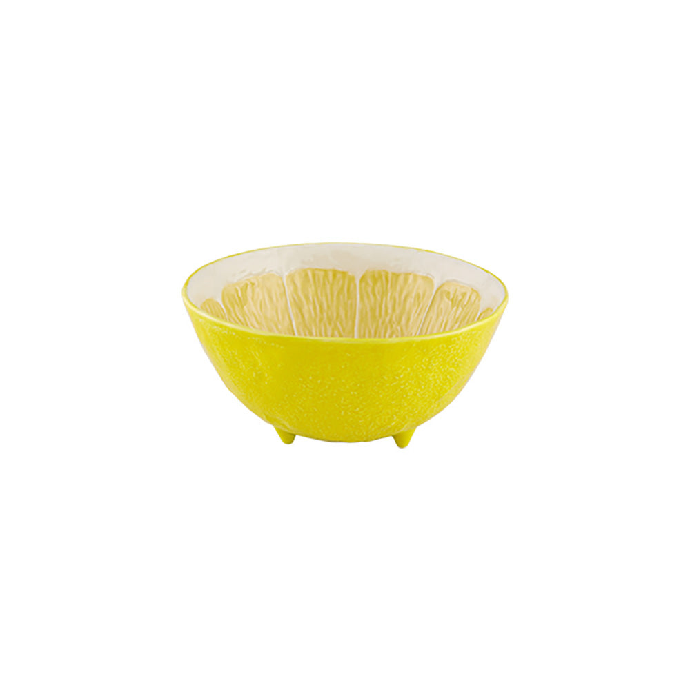 The Lemon Collection by Bordallo Pinheiro features a small yellow bowl with textured exterior, light interior, and leaf-like pattern on three feet—ideal for adding whimsical charm to your tableware.