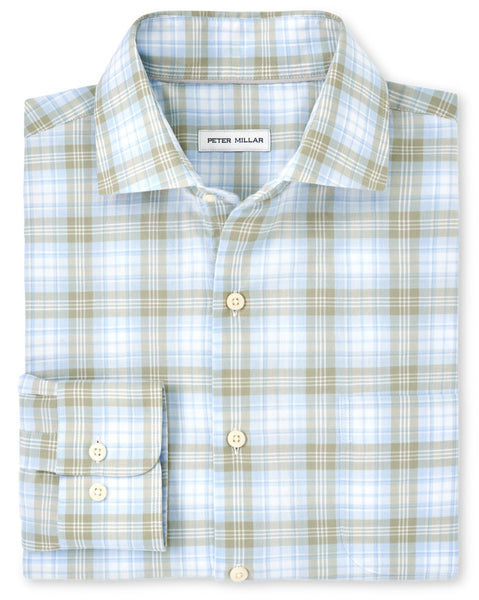Folded blue and white plaid cotton twill shirt on display with the brand tag "Peter Millar" visible on the inside collar.