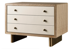 A Waterfall Nightstand by McGuire Furniture with a light mica finish and metal handles, supported by two sturdy metal legs.