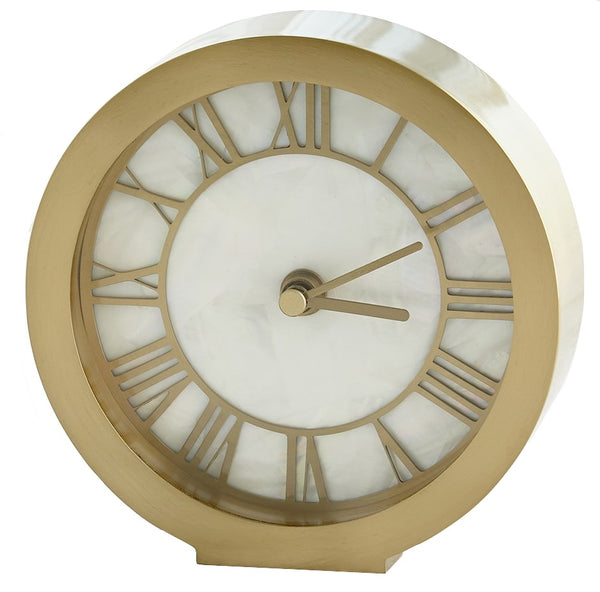 A round gold clock with a marbled white face featuring Roman Numerals and satin brass hands pointing at 10:10, powered by an AA battery. Introducing the Brass and Mother of Pearl Clock by Global Views.