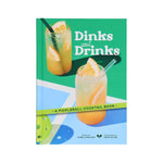 The cover of Chronicle Books’ "Dinks & Drinks" shows two cocktails with a pickleball paddle and ball—an ideal choice for fans looking for fun pickleball-themed drink recipes.