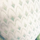 Close-up of the 22" x 22" Arrowhead Rainwashed Pillow by Hive Custom Pillows, featuring a repeating scallop pattern in light green and white tones.