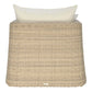 The Janus et Cie Zeya Outdoor Lounge Chair features beige wicker, a wide back, and a white cushion, shown from behind against a white background—ideal for stylish, weather-resistant outdoor living.