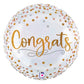 The Signature Balloon by Burton+Burton is a round foil balloon adorned with gold and pink polka dots, featuring the word "Congrats" in elegant gold script at its center. Perfect for pairing with floral arrangements or adding to a bundle of balloons, this celebratory piece also comes with the convenience of local delivery.