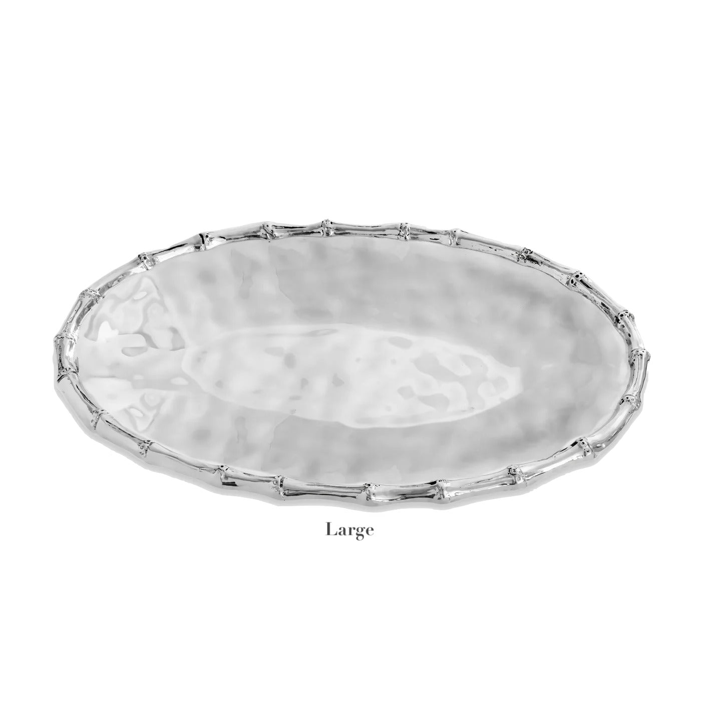 A Beatriz Ball Garden Bamboo Oval Tray from the collection, crafted from aluminum alloy with a hammered finish and bamboo-style rim, is pictured on a white background.