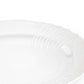 A close-up of the Vecchio White Oval Platter by Ginori 1735, featuring a textured, scalloped rim and showcasing exquisite craftsmanship on a plain white background.