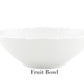 A plain white porcelain fruit bowl from the Vecchio White Dinnerware Collection by Ginori 1735, featuring a scalloped edge, is shown against a white background with "Fruit Bowl" labeled below.