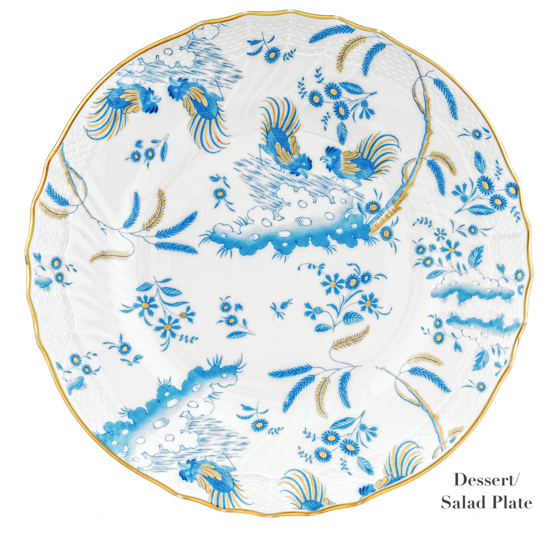 The Oro Di Doccia Turchese Dinnerware Collection by Ginori 1735 features a round porcelain plate with hand-painted gold accents, blue floral designs, Ji Ondori roosters, scalloped edges, and gold trim; “Dessert/Salad Plate” in bottom right.