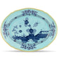 The Ginori 1735 Oriente Italiano Iris with Gold plate features blue and white floral and scenic patterns, a gold-edged rim, and is inspired by classic Faenza ceramics; shown on a plain white background.