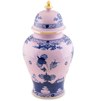 The Oriente Italiano Azalea with Gold Vase and Cover by Ginori 1735 features blue floral patterns and gold accents on a pale pink base, inspired by their iconic collection.
