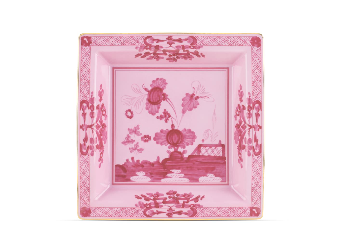 The Oriente Italiano Porpora square porcelain dish from Ginori 1735 features pink floral and lattice patterns, gold trim, and a central flowers-and-fence motif—a refined accent piece for your décor.
