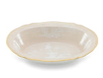 This shallow, oval ceramic serving dish from the Ginori 1735 Oriente Italiano Meringa collection features a white motif and gold trim—an elegant addition to your tableware.