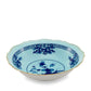 The Oriente Italiano Iris with Gold Dinnerware Bowl by Ginori 1735 features a scalloped edge, light blue interior, dark blue floral motifs, and a gold rim—reflecting refined Faenza ceramic style against a white background.