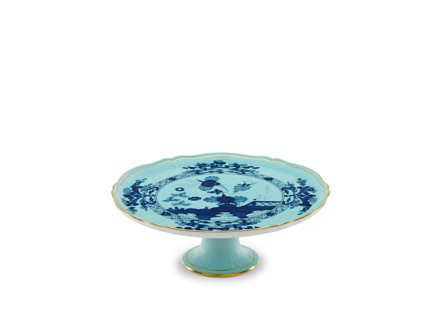 The Ginori 1735 Oriente Italiano Iris with Gold Cake Stand features light blue porcelain, a gold-trimmed edge, and a blue floral motif inspired by Faenza ceramics, set against a white background.