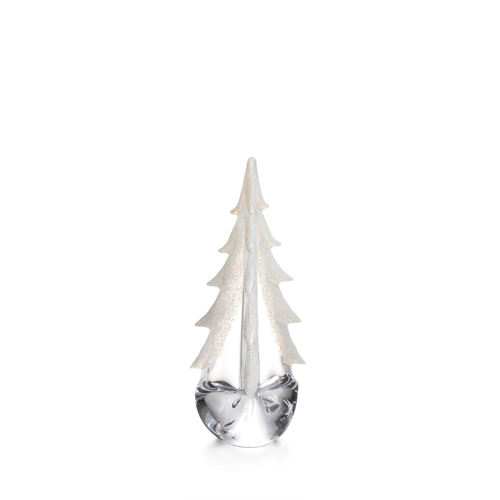 The Simon Pearce Snowy Branches Evergreen Tree Collection features a clear glass Christmas tree with frosted accents, inspired by Vermont winter woods, shown against a plain white background.