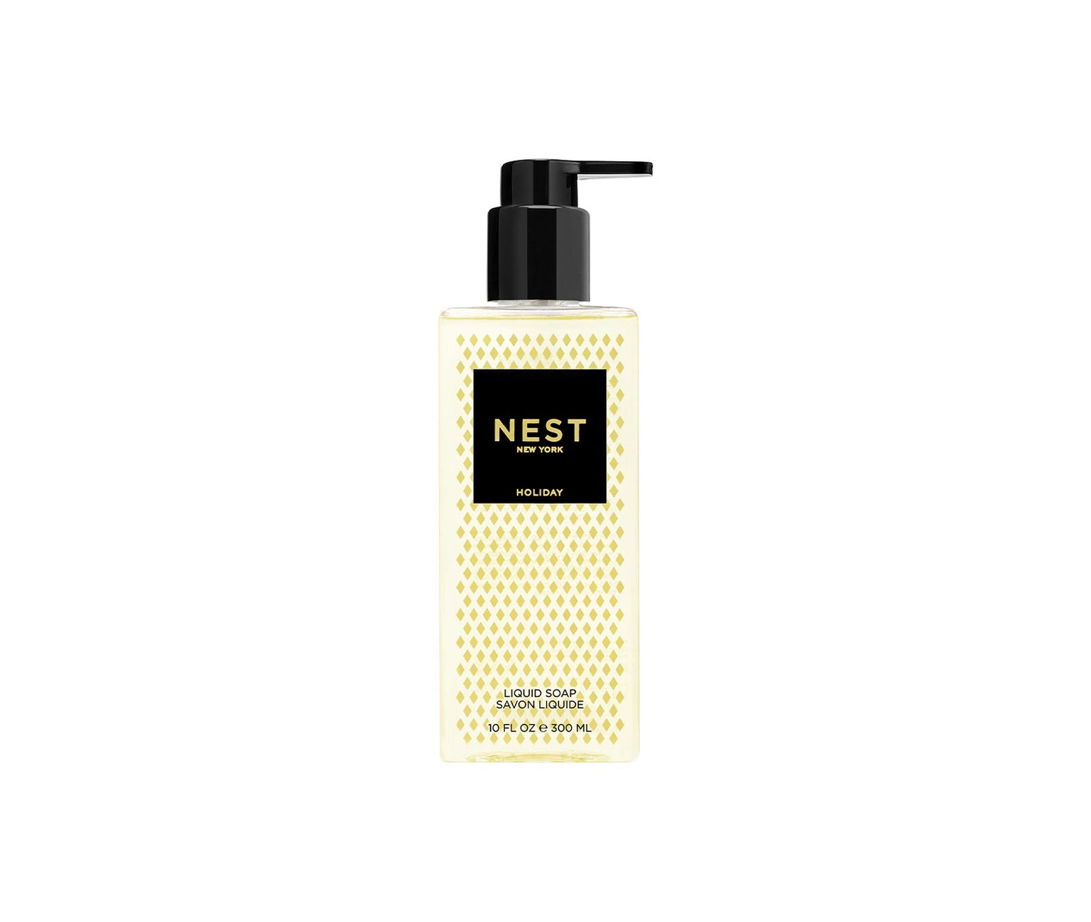 The NEST Holiday Collection liquid soap by Nest comes in a clear 10 fl oz pump bottle with a black and gold label, capturing the beloved Holiday fragrance from the iconic Nest candle.