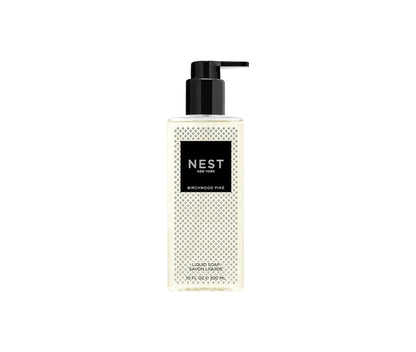 Nest’s Birchwood Pine Collection liquid soap comes in a clear pump bottle with a black label and pump (10 fl oz/300 ml), filling your home with the crisp winter forest scent from their signature holiday candle.