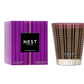 The Nest Autumn Plum Candle Collection features a premium scented candle and a purple patterned box with gold and black accents, perfect for bringing fall elegance into your home.