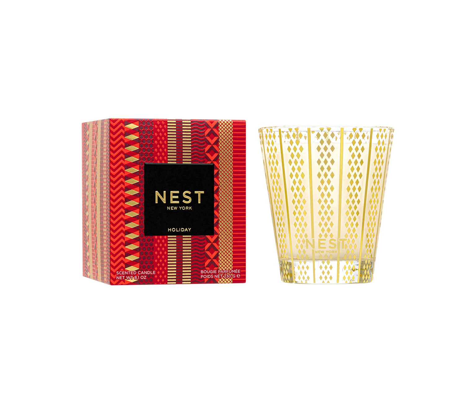 The Nest Holiday Collection candle by Nest, in a gold-patterned glass with its festive red and gold box, fills your space with the signature Holiday fragrance.
