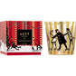 The NEST Holiday Collection candle by Nest features a festive Holiday scent and comes in decorative packaging with illustrated figures and a matching glass holder.