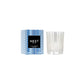 A Nest Blue Cypress & Snow Collection candle with smoked vanilla bean winter scent, in a clear glass holder next to its blue and white patterned box featuring a black label.