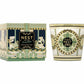 A 3-wick Pierre Marie Birchwood Collection candle in a matching glass vessel and decorative box, featuring intricate geometric and carousel-themed patterns in green, gold, and dark blue.
