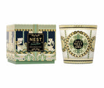 A 3-wick Pierre Marie Birchwood Collection candle in a matching glass vessel and decorative box, featuring intricate geometric and carousel-themed patterns in green, gold, and dark blue.