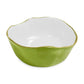 The Beatriz Ball Encanto Green Serveware Collection features a green ceramic bowl with a white interior, wavy rim, and elegant gold-toned accents.