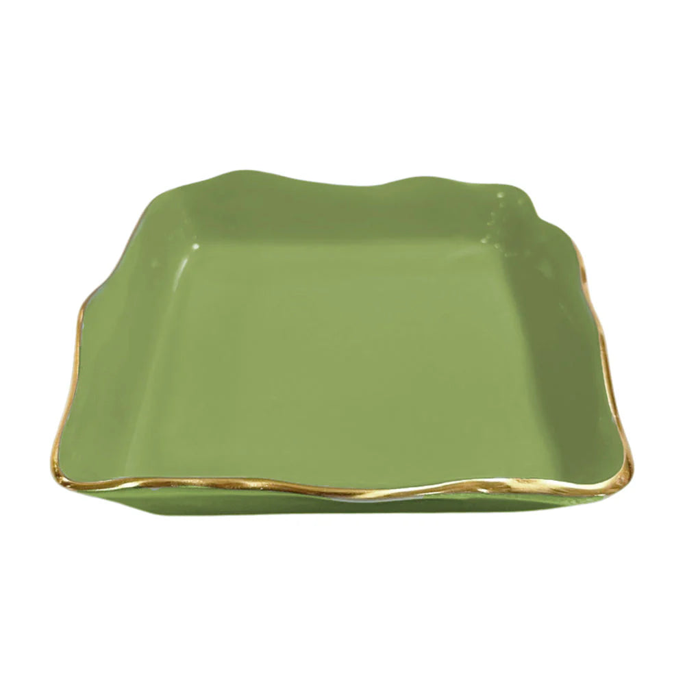 A square, green enamel ceramic dish with wavy edges and gold-toned accents from the Beatriz Ball ENCANTO Collection, set against a white background.