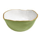 The Encanto Green Serveware Collection by Beatriz Ball features a small green enamel ceramic bowl with a white interior and an irregular gold-toned accent rim.