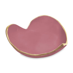 The Encanto Soho Mini Heart Dish Collection by Beatriz Ball features a small, pink ceramic heart-shaped bowl with a gold rim and abstract contours—perfect as a handmade gift from the multicolored ENCANTO line.