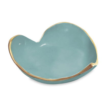 A small, uniquely shaped blue ceramic bowl with a gold rim from the Encanto Soho Mini Heart Dish Collection by Beatriz Ball—perfect as a handmade gift or a standout piece in the multicolored ENCANTO Collection.