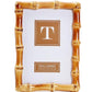 The Bamboo Natural Frame Collection by Two's Company features a timeless rectangular bamboo-style design, labeled "TWO'S COMPANY 4 x 6 IN | 10 x 15 CM," displayed on a white background.