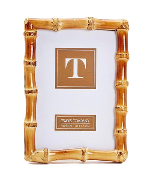 The Bamboo Natural Frame Collection by Two's Company features a timeless rectangular bamboo-style design, labeled "TWO'S COMPANY 4 x 6 IN | 10 x 15 CM," displayed on a white background.