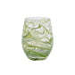 The Juliska Puro Marbled Drinkware Collection features clear glass tumblers with green and white swirls, evoking marbled goblets and seaglass hues, shown against a plain white background.